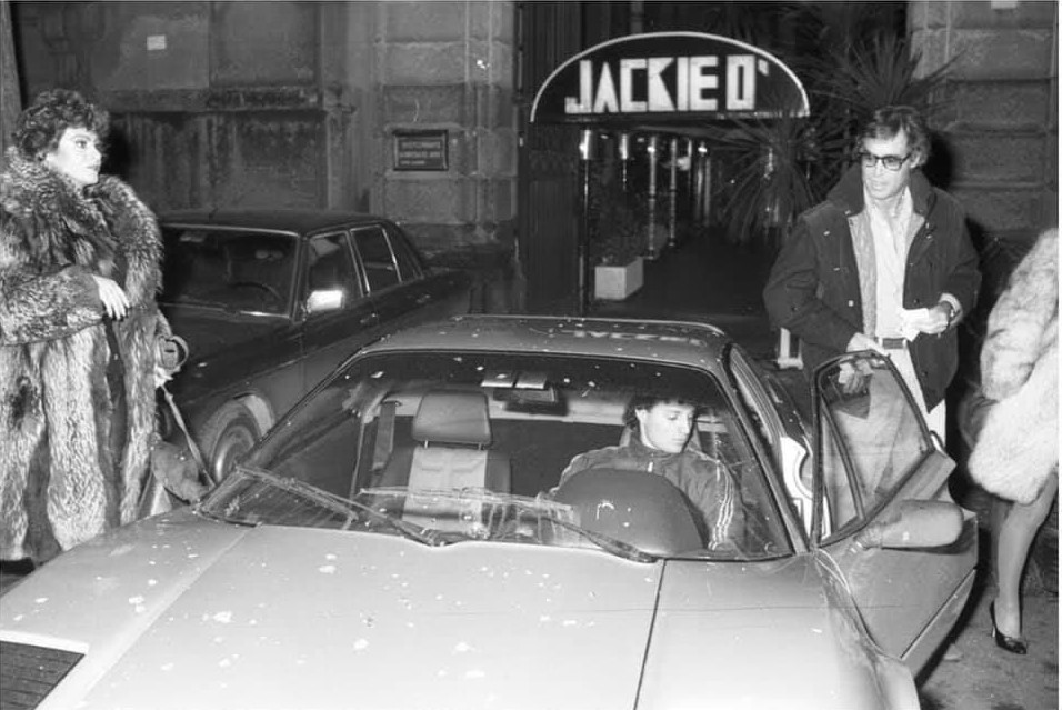 Franco Califano, his Ferrari and Carmen Russo at Jackie O’ in 1983.