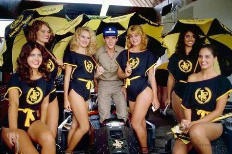 Ayrton Senna with the John Player Special promotional team.