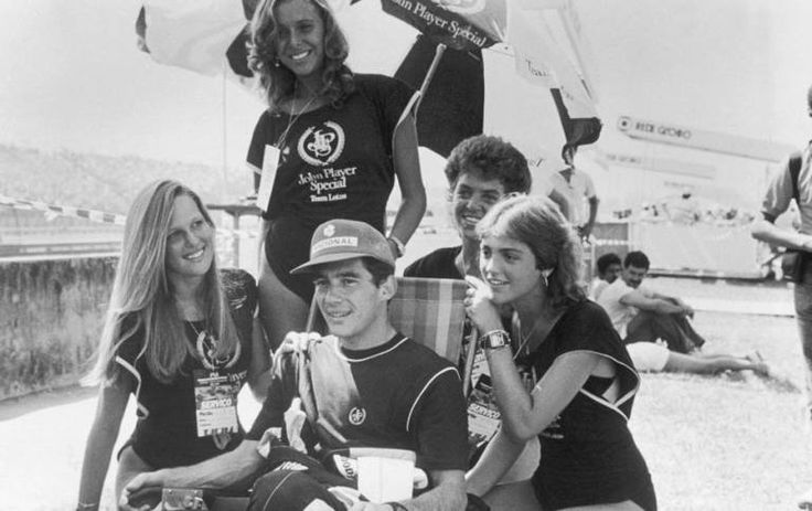 Ayrton Senna with the JPS girls.
