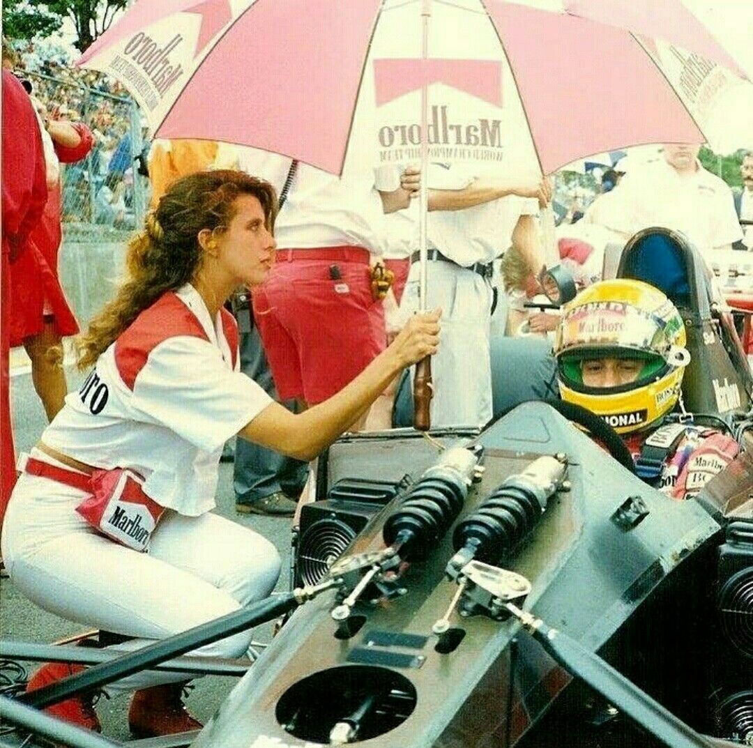 Ayrton Senna and a grid girl.