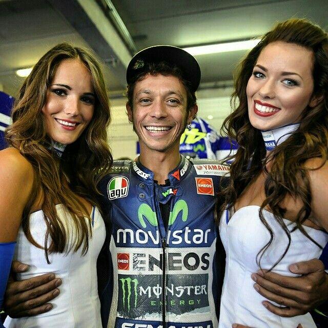 Valentino Rossi with two girls.