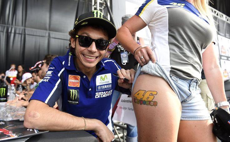 Valentino Rossi with a girl.