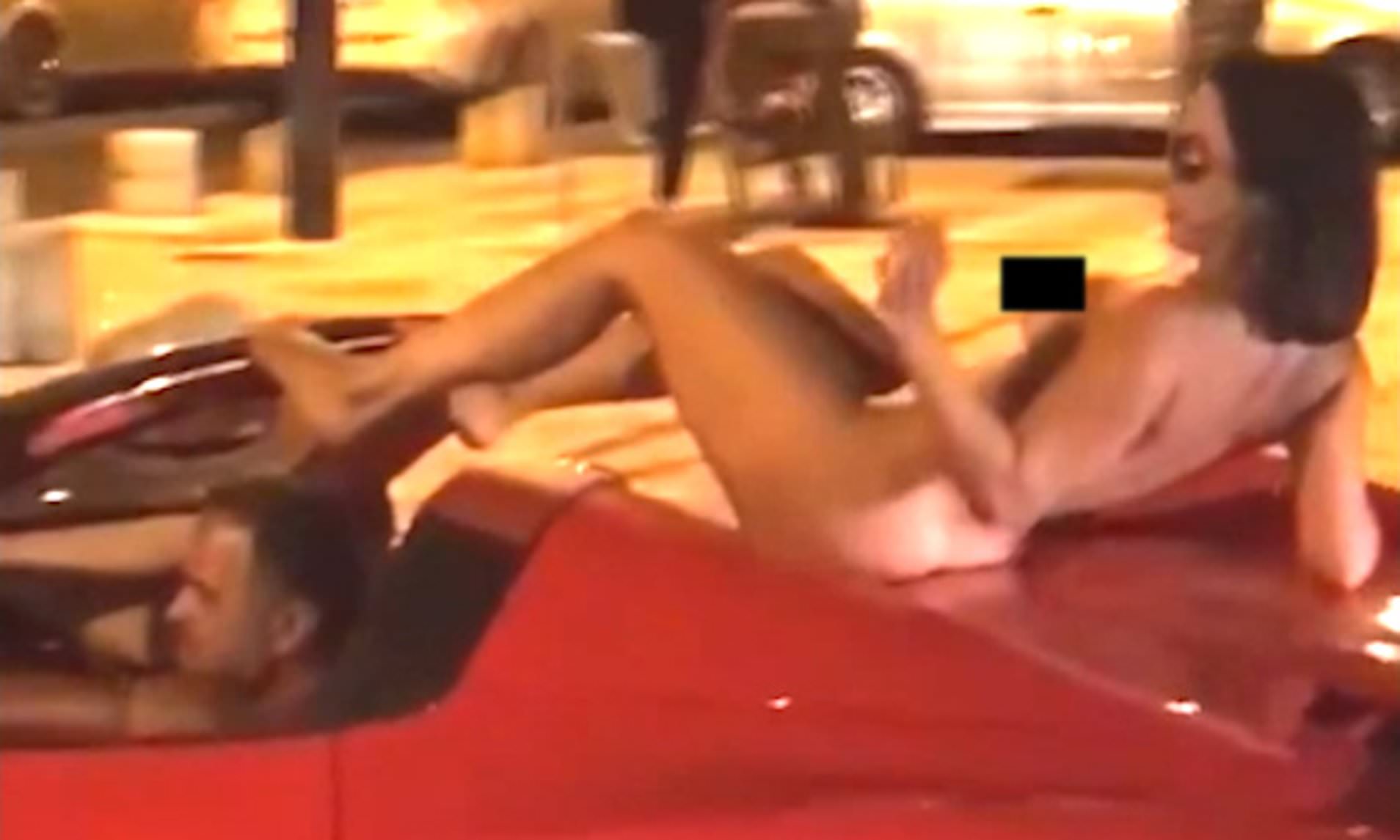 Naked woman sparks outrage after twerking on a Ferrari at Ibiza in August 2019.