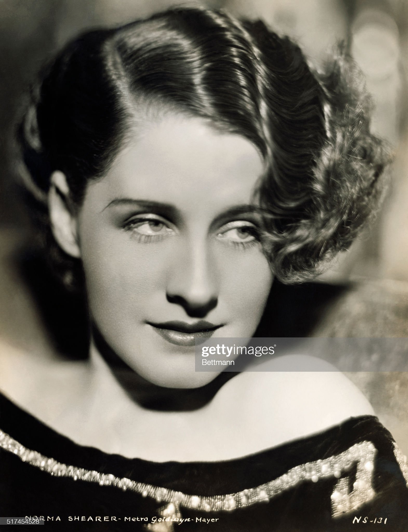 Norma Shearer is seen here, she is an American actress. 