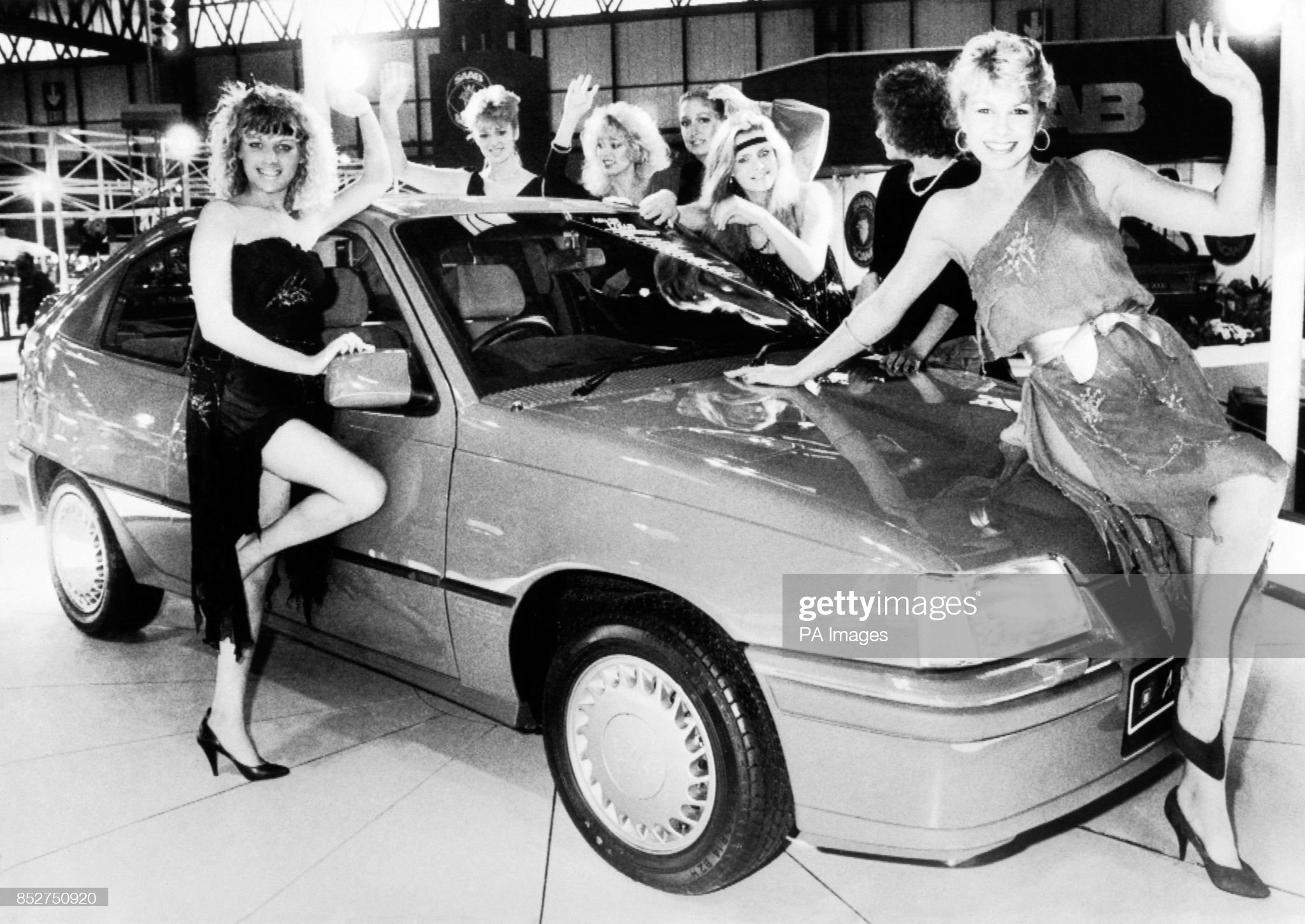 Vauxhall Opel girls with the new shape Astra GTE at the press preview of the 1984 Motor Show in Birmingham on October 10, 1984.