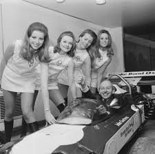 John Surtees with some girls.