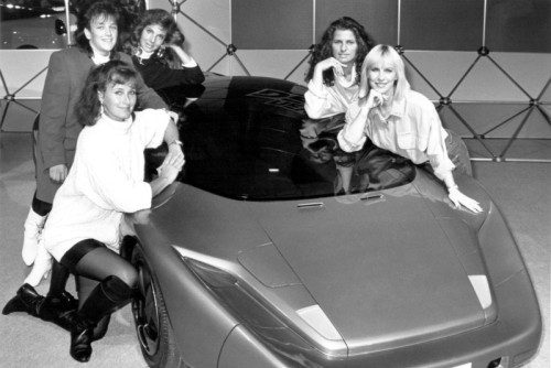 Essen Motor Show, 1991. Girl racers, a concept car and some of our currently favourite early ‘90s fashions. High waisted, loose fitting jeans and long-line everything.