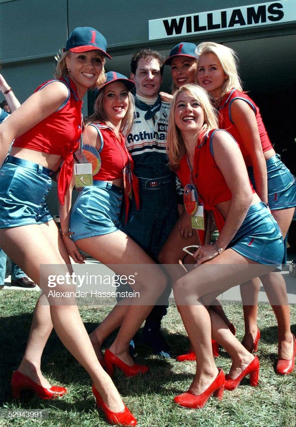 Jacques Villeneuve, Williams, with girls at the Australian GP in Melbourne, on March 07, 1996. 
