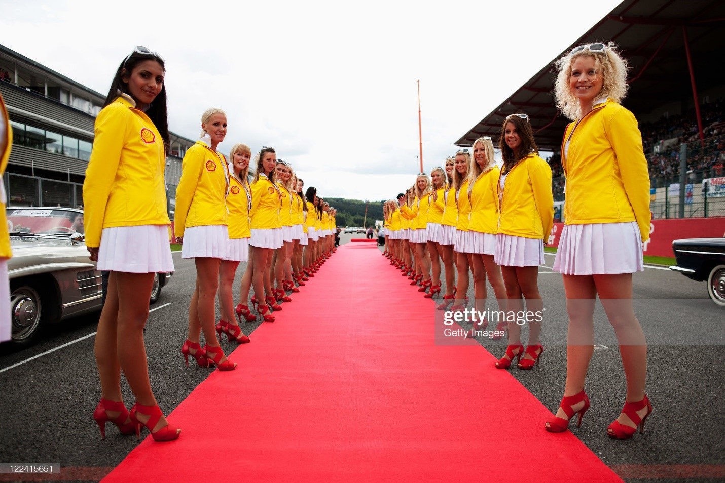 Shell grid girls are seen before the Belgian Formula One Grand Prix at the Circuit of Spa Francorchamps on August 28, 2011 in Spa Francorchamps, Belgium. 