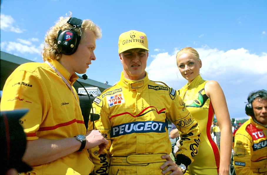 Jordan driver Ralf Schumacher with a grid girl at Hockenheim, Germany, in 1997.