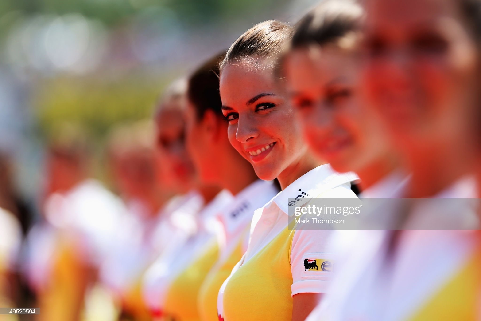 Grid girls attend the drivers parade before the Hungarian Formula One Grand Prix at the Hungaroring on July 29, 2012 in Budapest, Hungary.