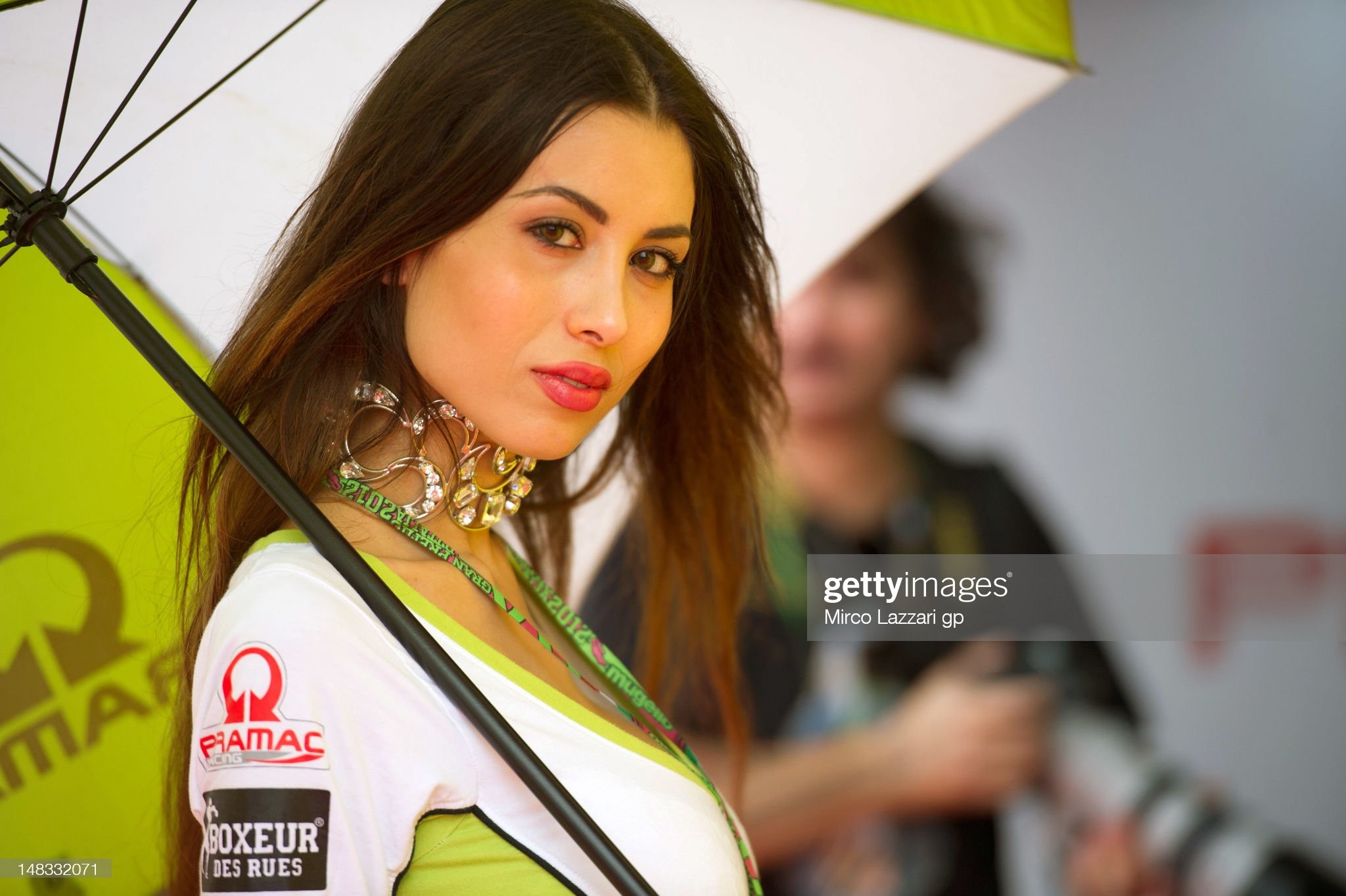 A grid girl poses at the pits during the qualifying practice of MotoGP at Mugello Circuit on July 14, 2012 in Scarperia, Italy. 