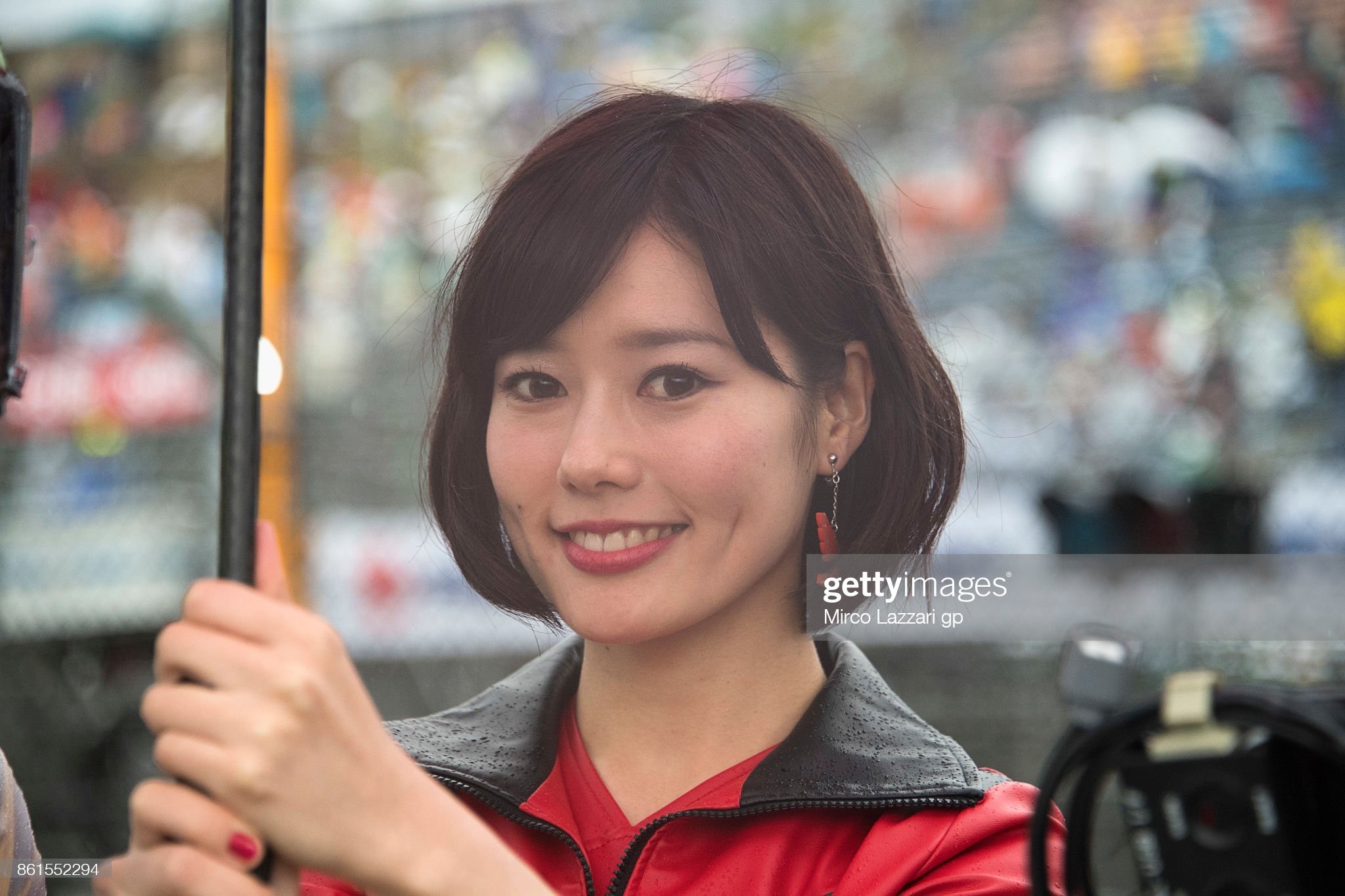 A grid girl poses on the grid during the Moto2 race during the MotoGP of Japan at Twin Ring Motegi on October 15, 2017 in Motegi, Japan. 
