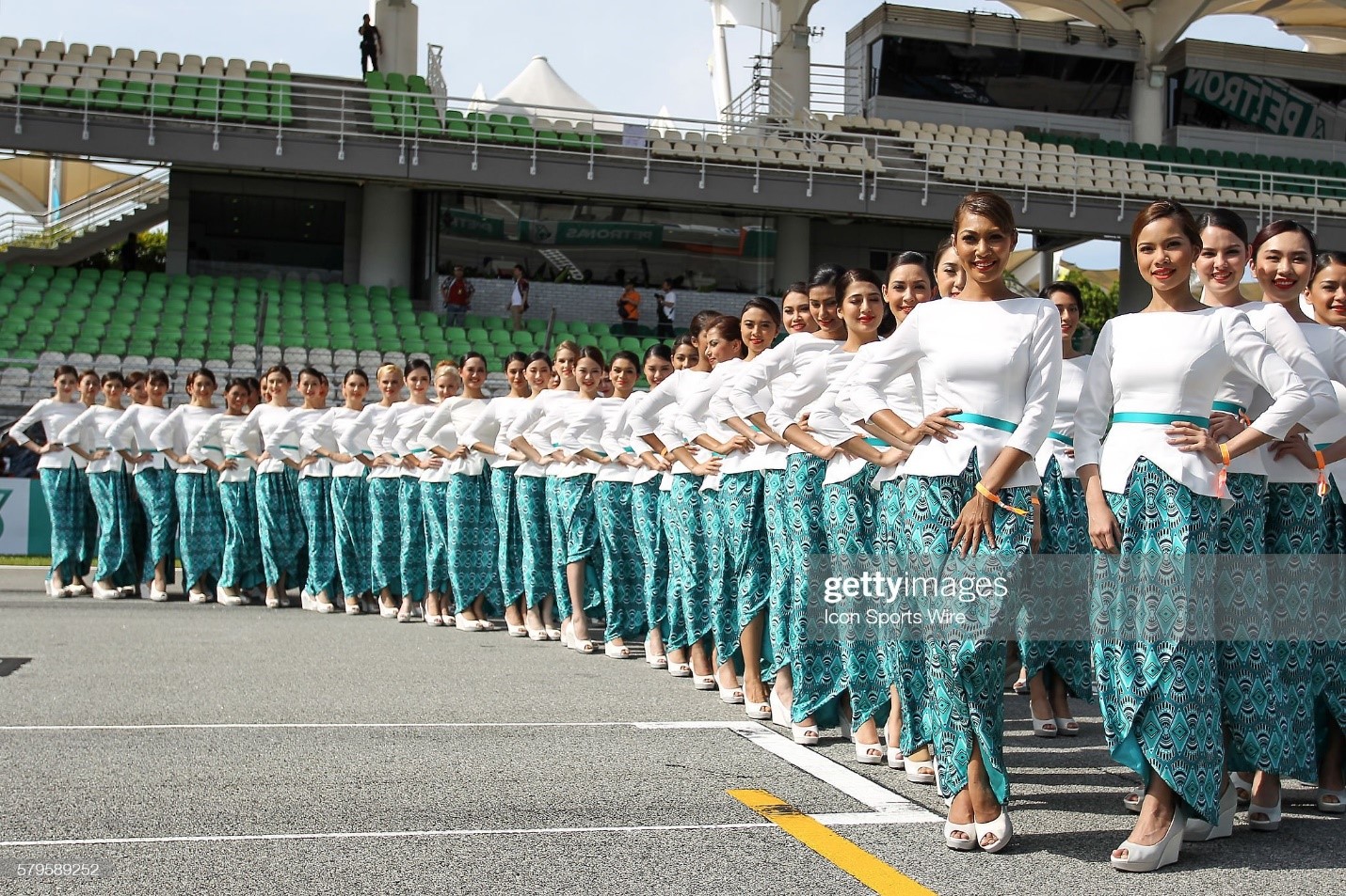 29 March 2015: grid girls pose for photograph before the start of the race of the Formula 1 Malaysia Grand Prix held at Sepang International Circuit in Sepang, Malaysia. 