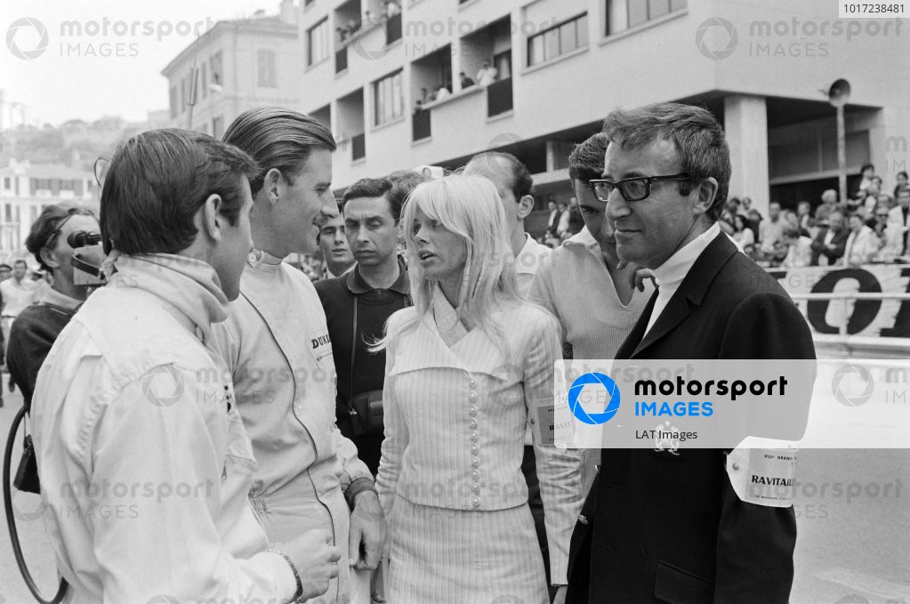 May 22, 1966, Monaco GP, Jackie Stewart and Graham Hill talk with actor Peter Sellers and his wife Britt Ekland.