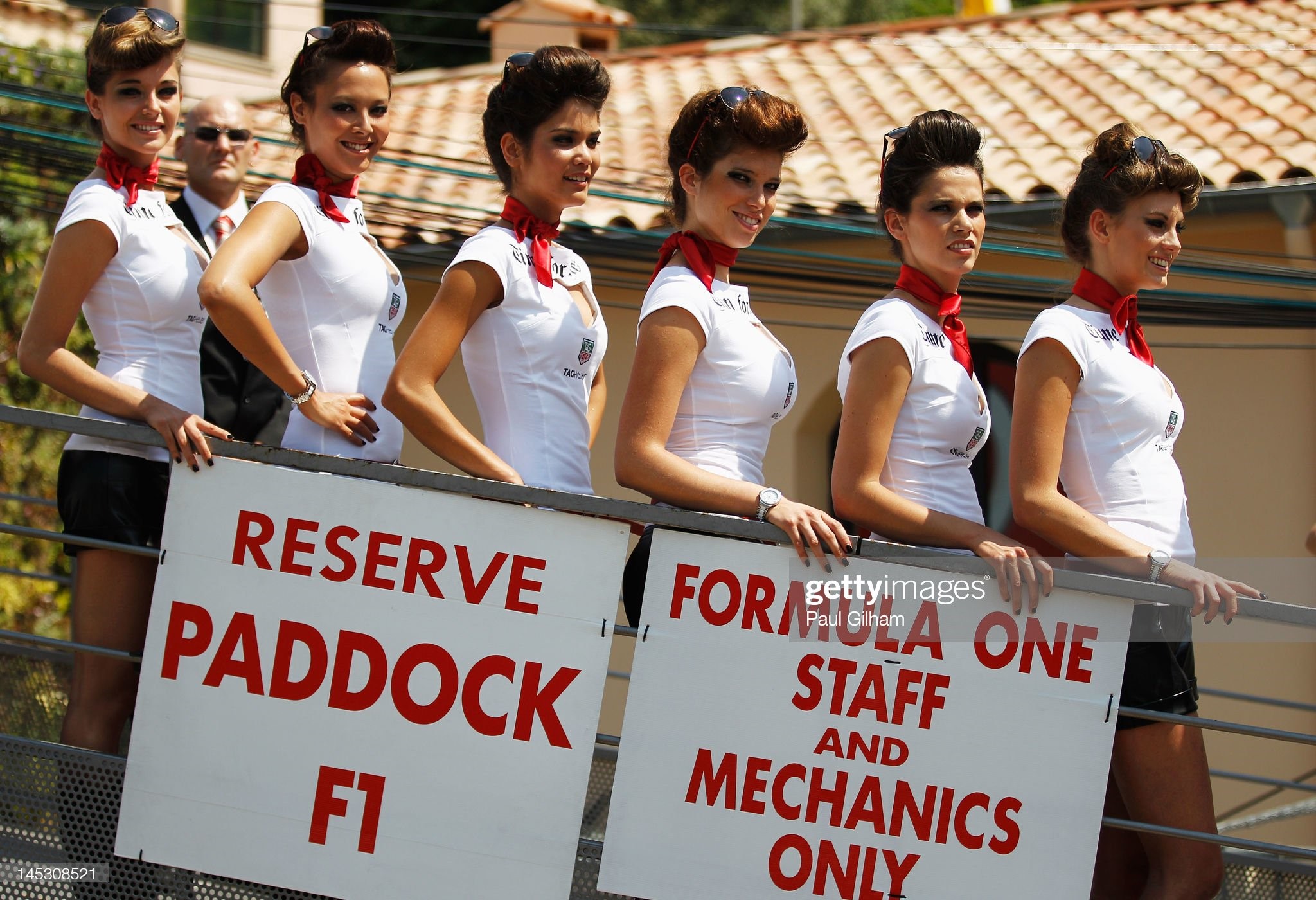 Grid girls line up at the entrance to the pitlane during qualifying for the Monaco Formula One Grand Prix at the Circuit de Monaco on May 26, 2012 in Monte Carlo, Monaco.