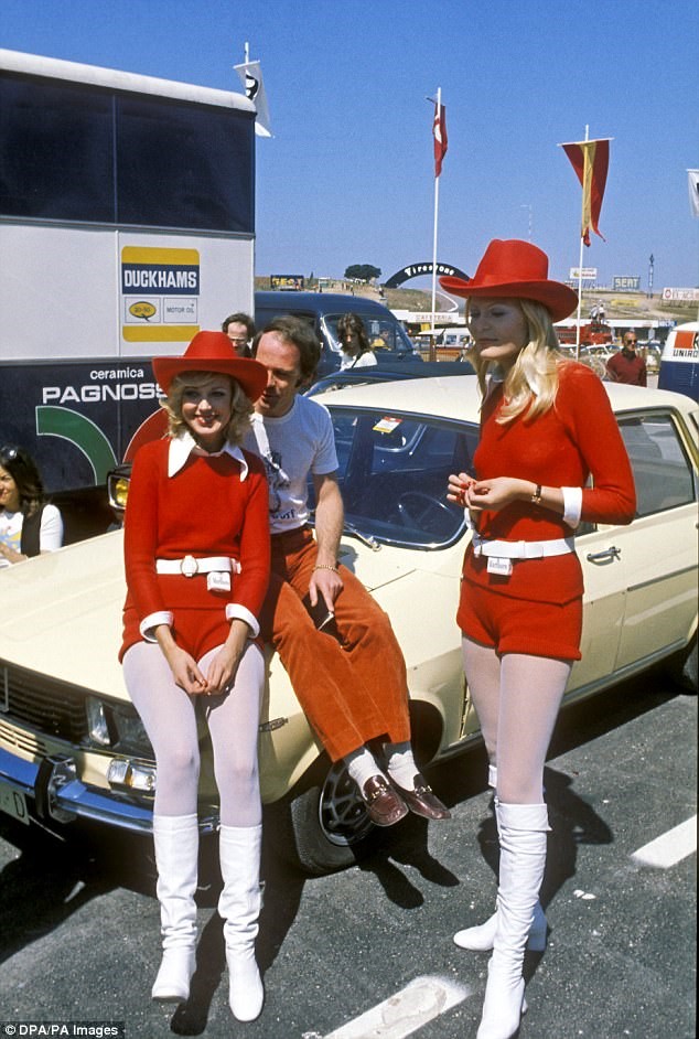 BRM driver Peter Gethin with two Marlboro pit-babes before the 1972 Spanish Grand Prix at Jarama.