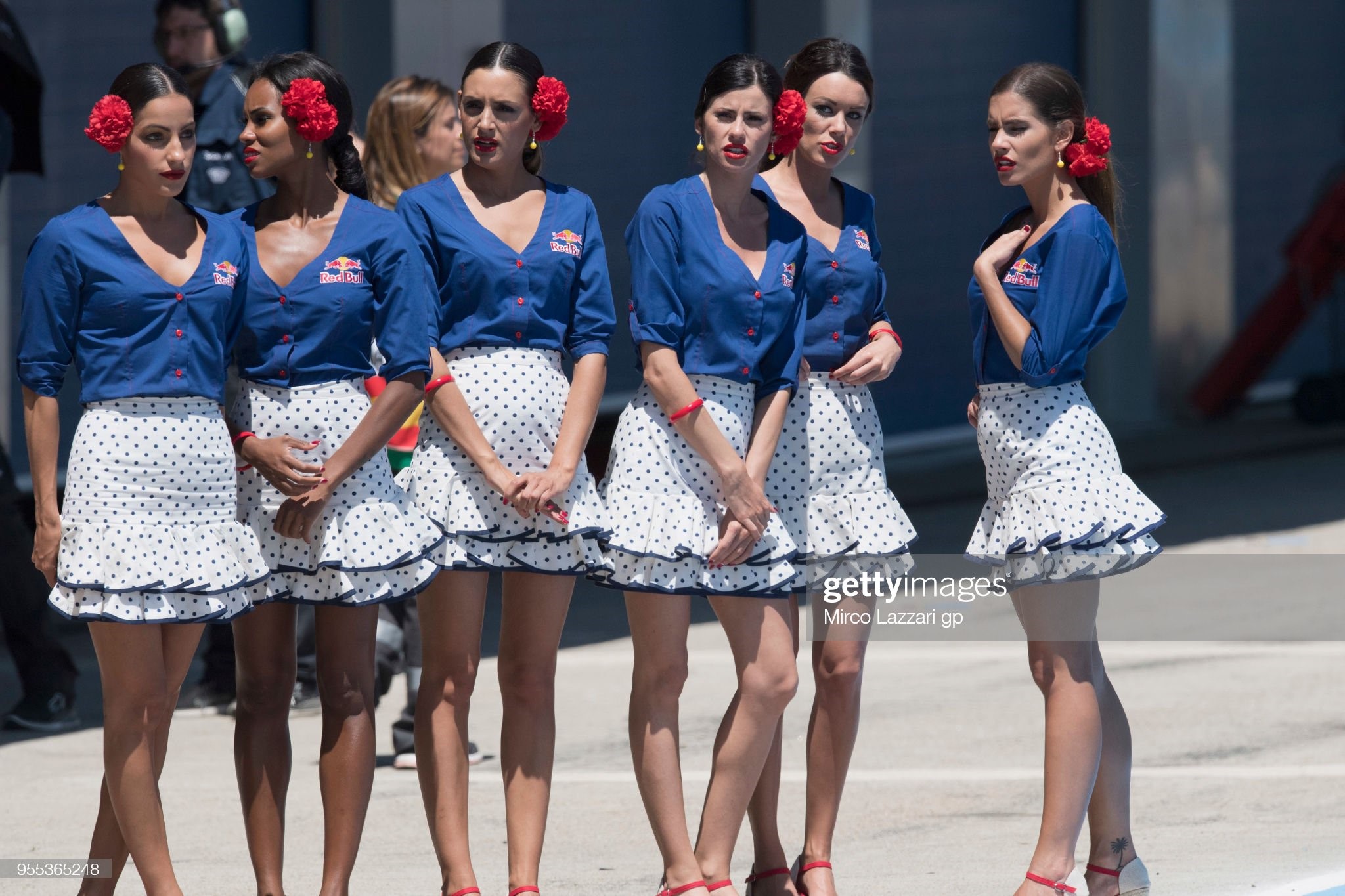 Grid girls smile in the pits during the MotoGp of Spain at Circuito de Jerez on May 06, 2018 in Jerez de la Frontera, Spain. 