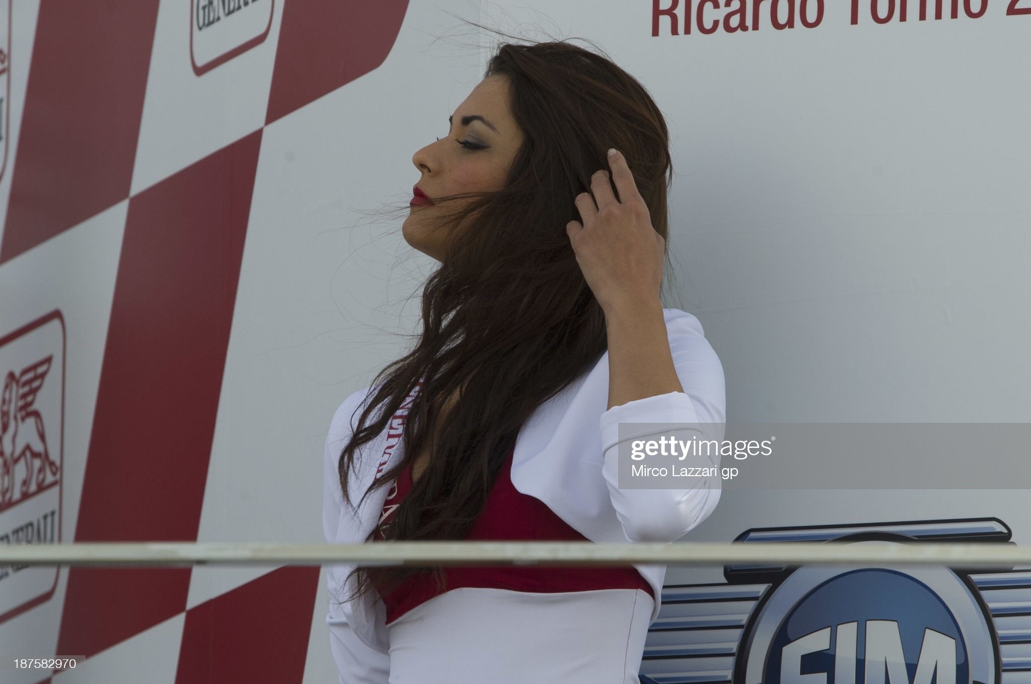 A grid girl poses on podium during the MotoGP race of Valencia at Ricardo Tormo Circuit on November 10, 2013 in Valencia, Spain. 