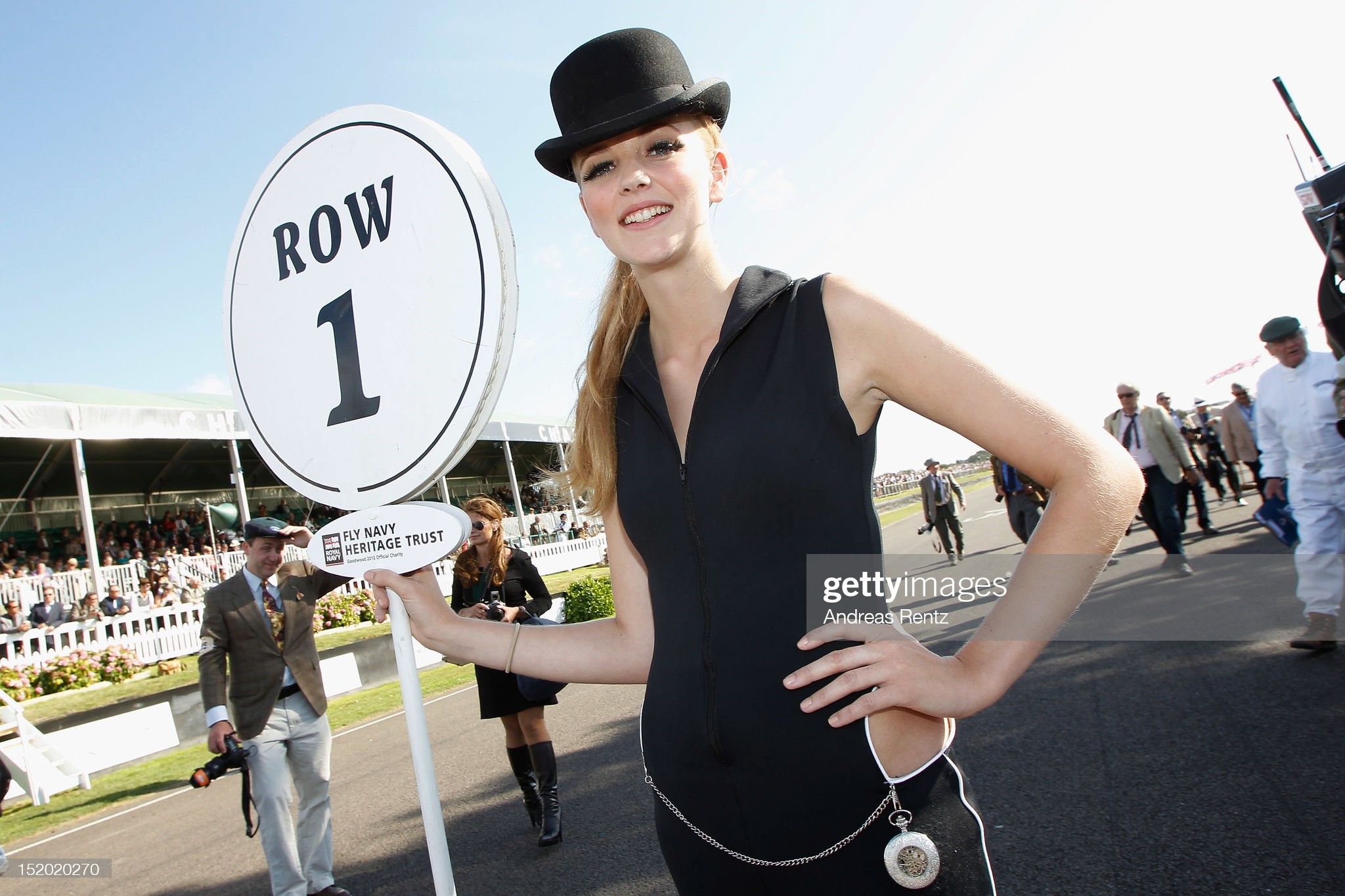 A grid girl attends the Shelby Cup during the Goodwood Revival 2012 on September 15, 2012 in Chichester, United Kingdom. 