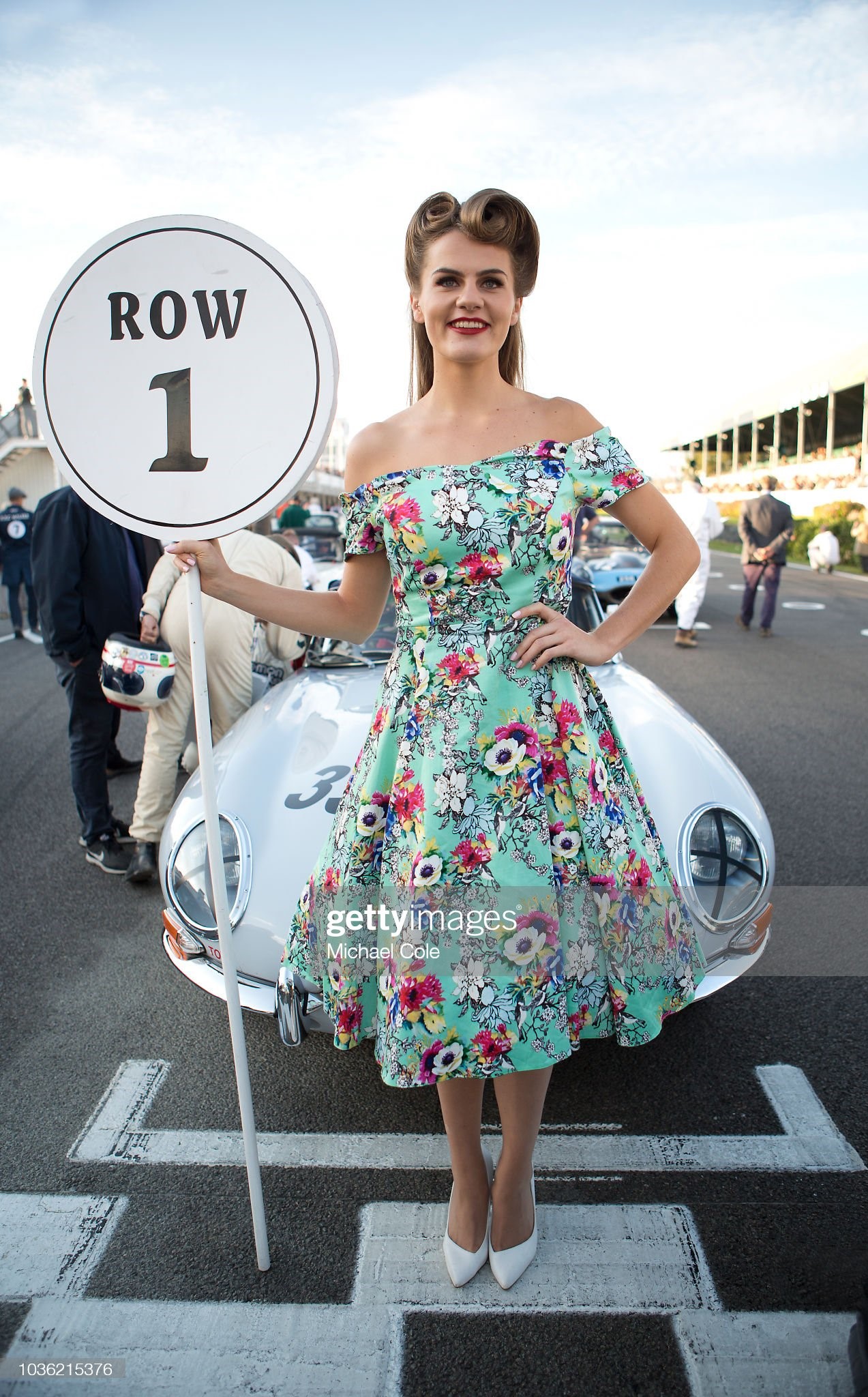 Grid girl on start grid prior to the Kinrara Trophy race during the 20th anniversary of the Goodwood Revival at Goodwood on September 07th 2018 in Chichester, England. 