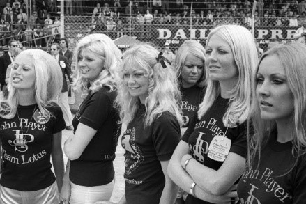 The JPS girls enjoy walk along the grid before the start of the race. British GP, Silverstone, 14 July 1973.