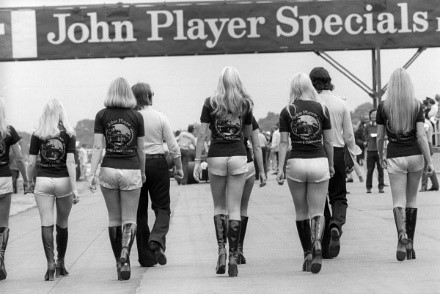 The JPS girls walk along the grid before the start of the race. British GP, Silverstone, 14 July 1973.