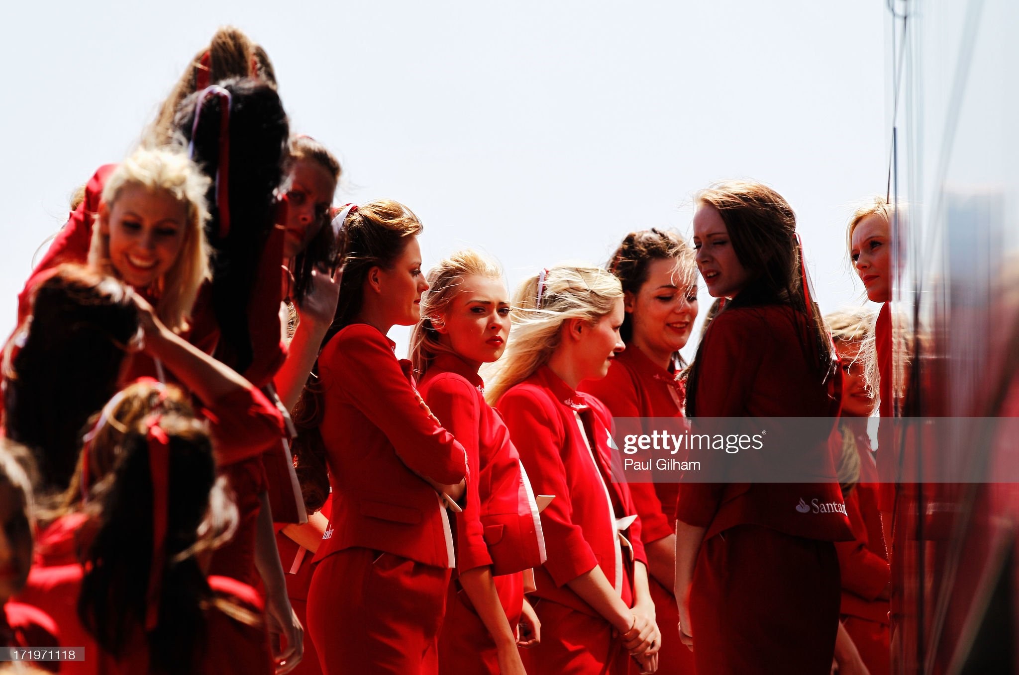 Grid girls line up for the podium celebrations at the end of the British Formula One Grand Prix at Silverstone Circuit on June 30, 2013 in Northampton, England. 