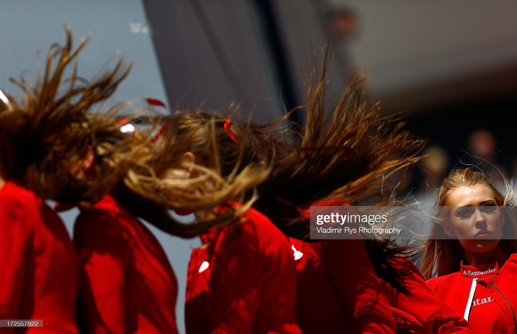 Grid girls are pictured after the British Formula One Grand Prix at Silverstone Circuit on June 30, 2013 in Northampton, England. 