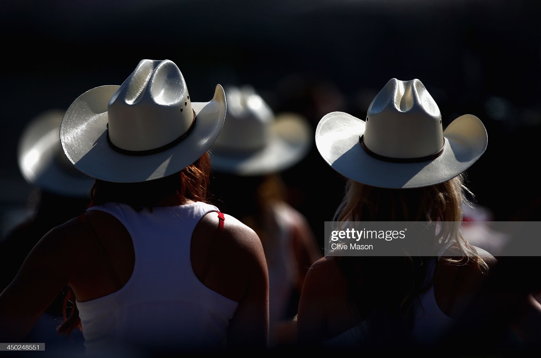 Grid girls are seen at the drivers parade before the United States Formula One Grand Prix at Circuit of The Americas on November 17, 2013 in Austin, United States. 