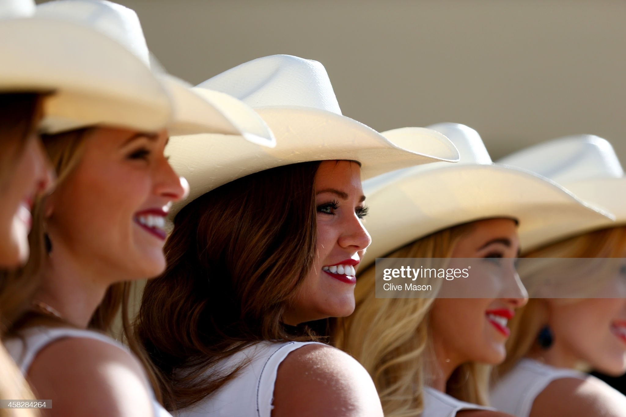 Grid girls pose before the United States Formula One Grand Prix at Circuit of The Americas on November 02, 2014 in Austin, United States. 
