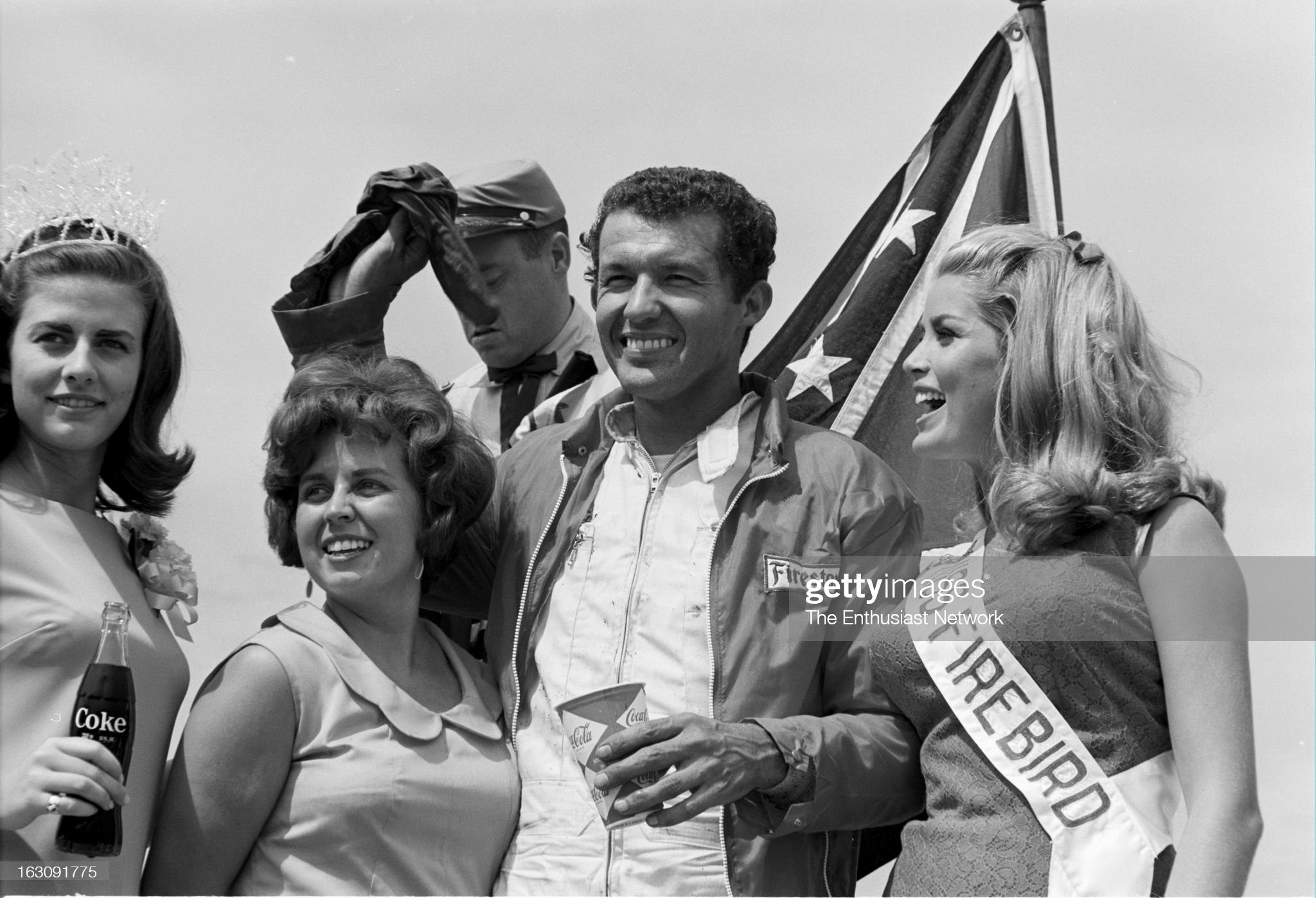 United States, September 06, 1967, Darlington Southern 500. Race winner Richard Petty celebrates his victory with the Southern 500 Race queen (left) and miss Firebird. 
