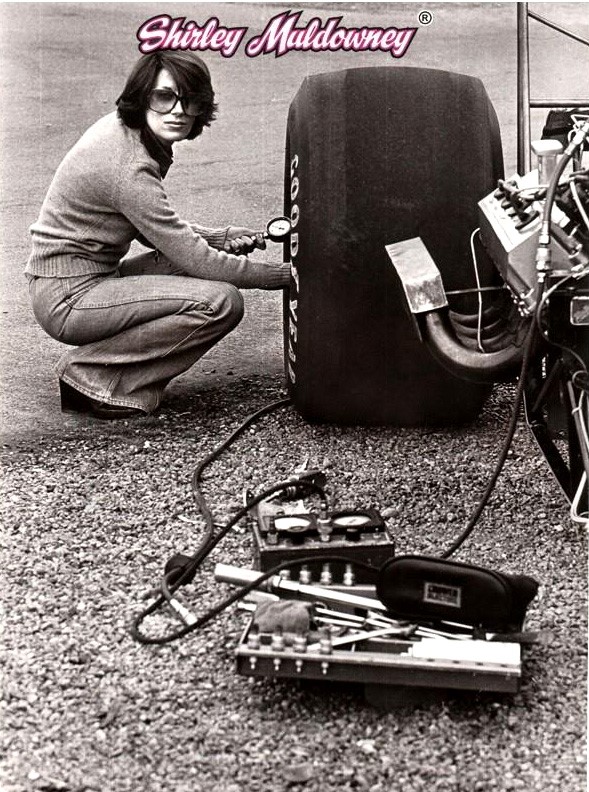 Shirley checking the tires.