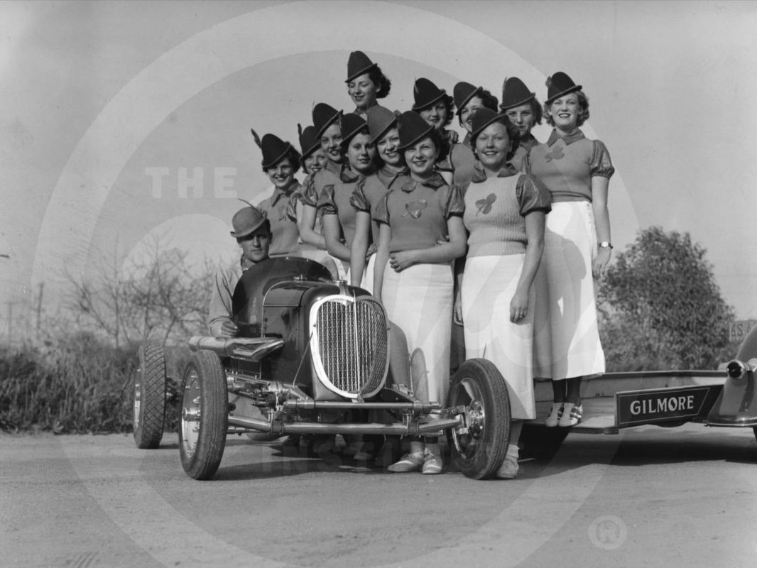 A vintage driver with some girls.