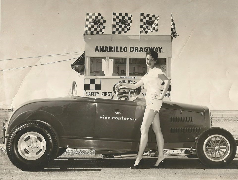 A vintage girl and a car.