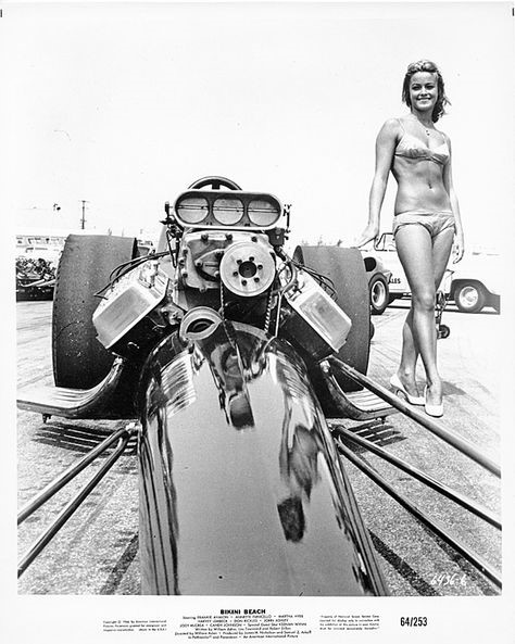 A vintage girl and a dragster.