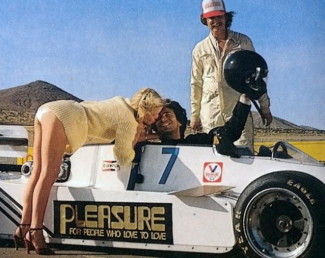 A blonde vintage girl kissing a driver.
