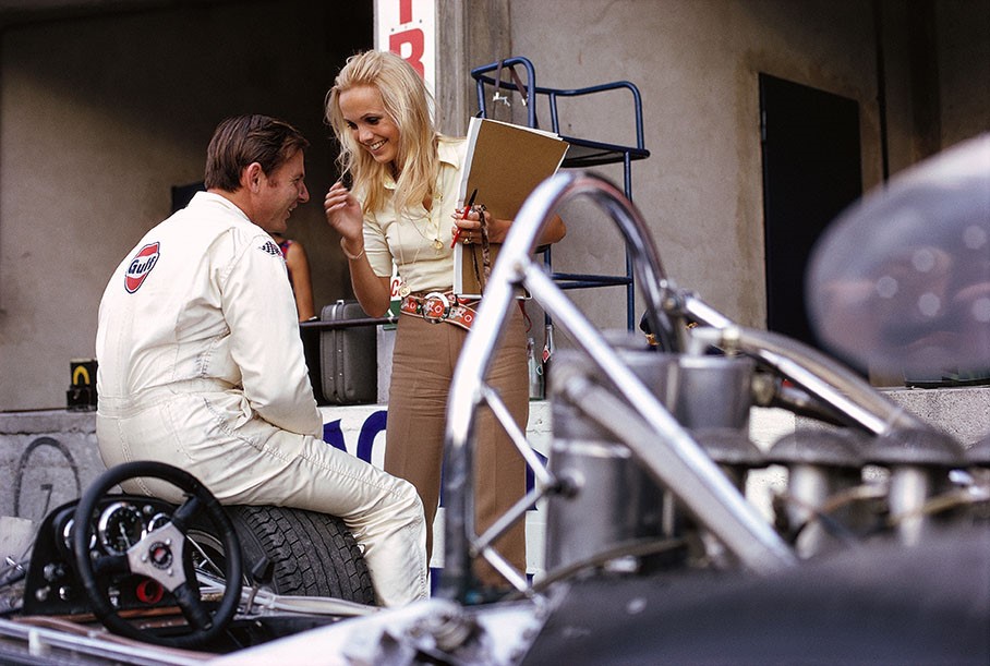 A girl and a driver at Monza in 1969.