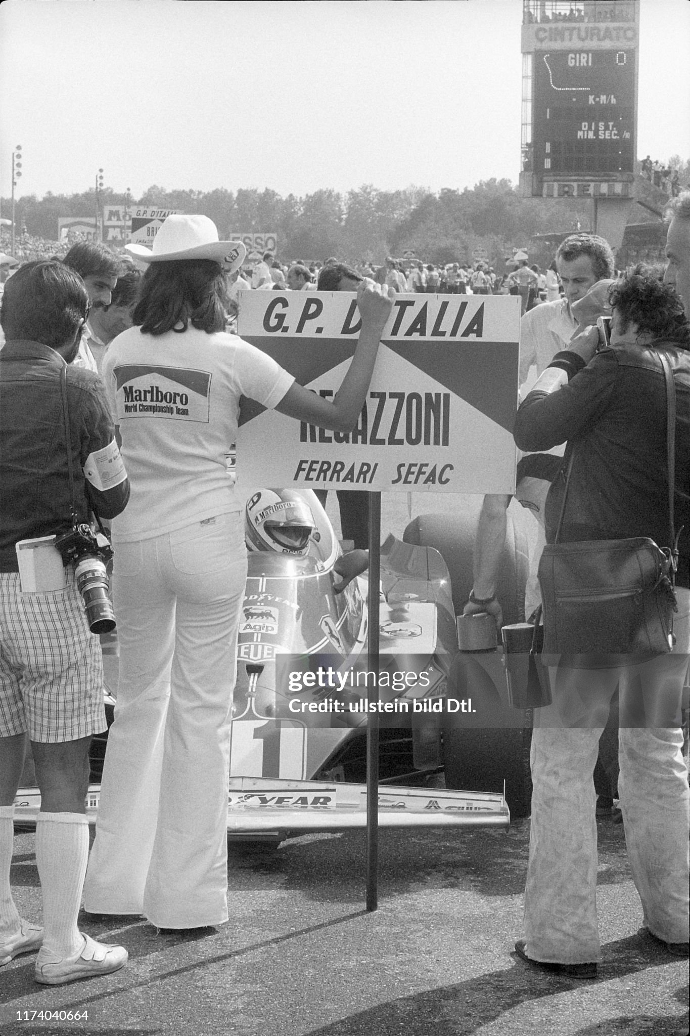A grid girl for Clay Regazzoni at the Italian Grand Prix in Monza in 1975. 