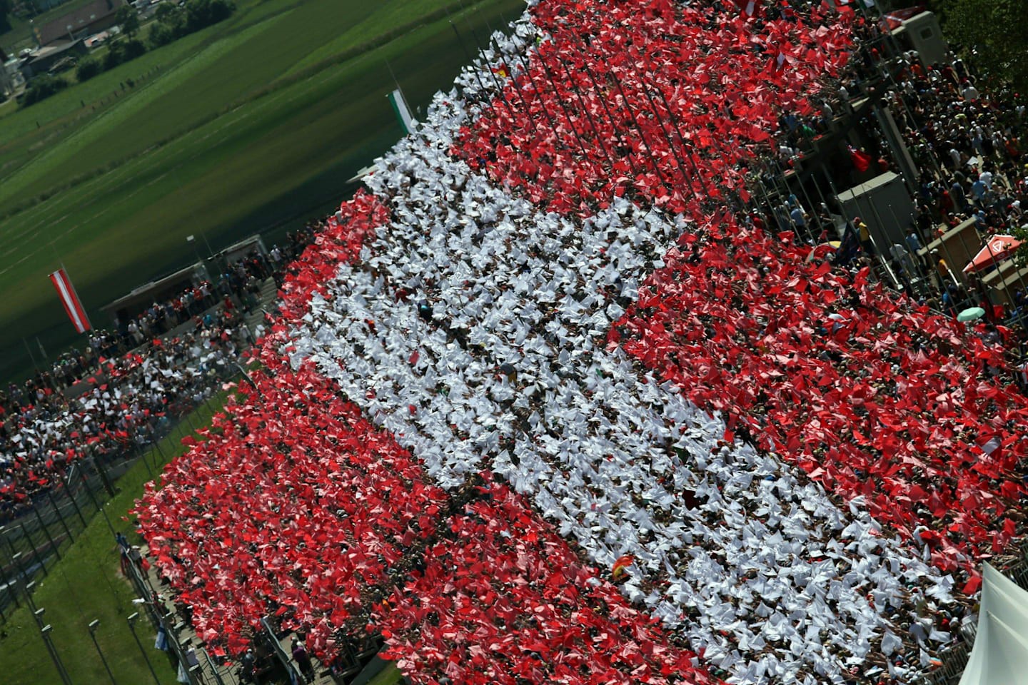 Fans form an Austrian flag at the Red Bull Ring. 