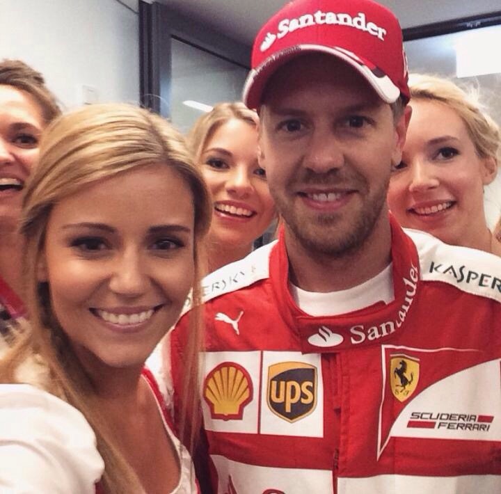Sebastian Vettel with a girl at Austrian GP 2016.
