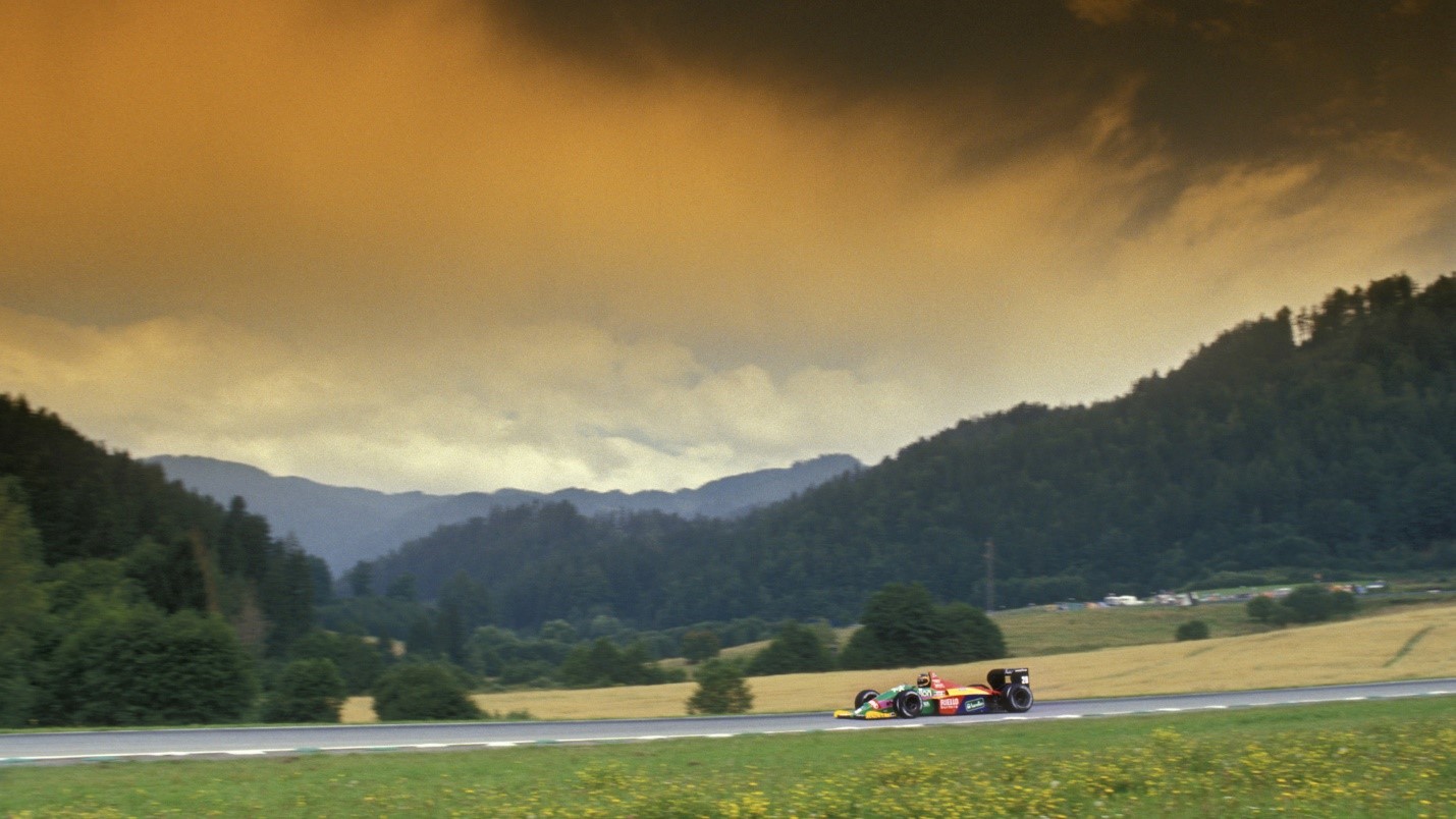 Thierry Boutsen in the picture-postcard scenery during the 1987 Austrian Grand Prix.
