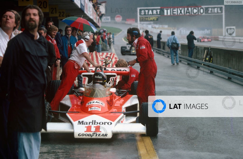 1976 Austrian Grand Prix. Osterreichring, Zeltweg, Austria. 13th - 15th August 1976. James Hunt (McLaren M23-Ford), 4th position, in the pits, action. 