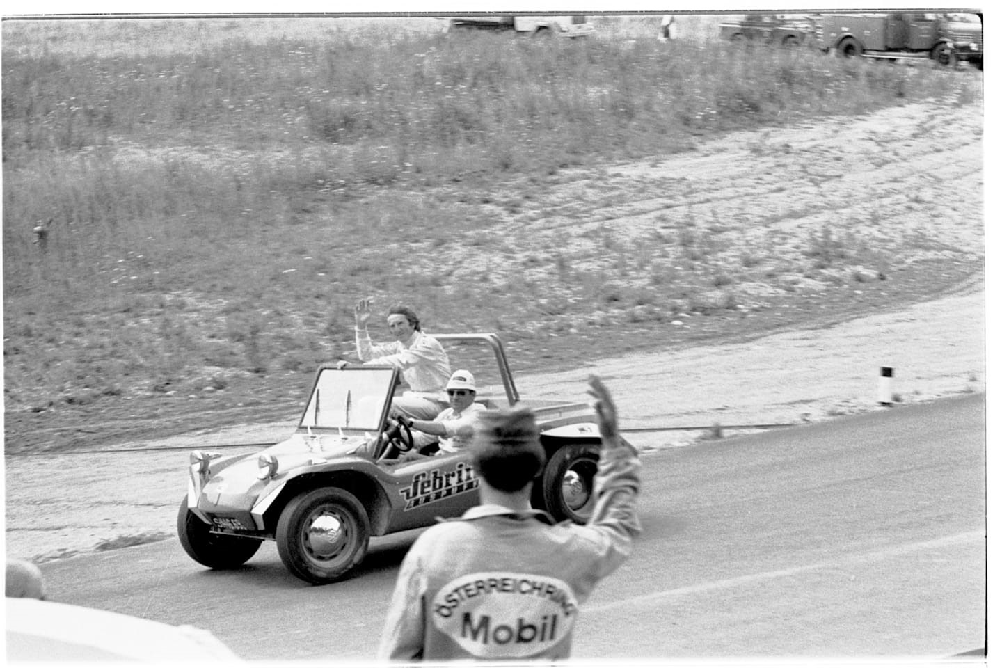 Drivers' parade in a Dune Buggy. 