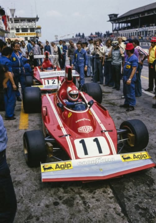 Clay Regazzoni and Niki Lauda, Ferrari 312B3, prepare to leave their pit at the German Grand Prix in Nürburgring on 04 August 1974.