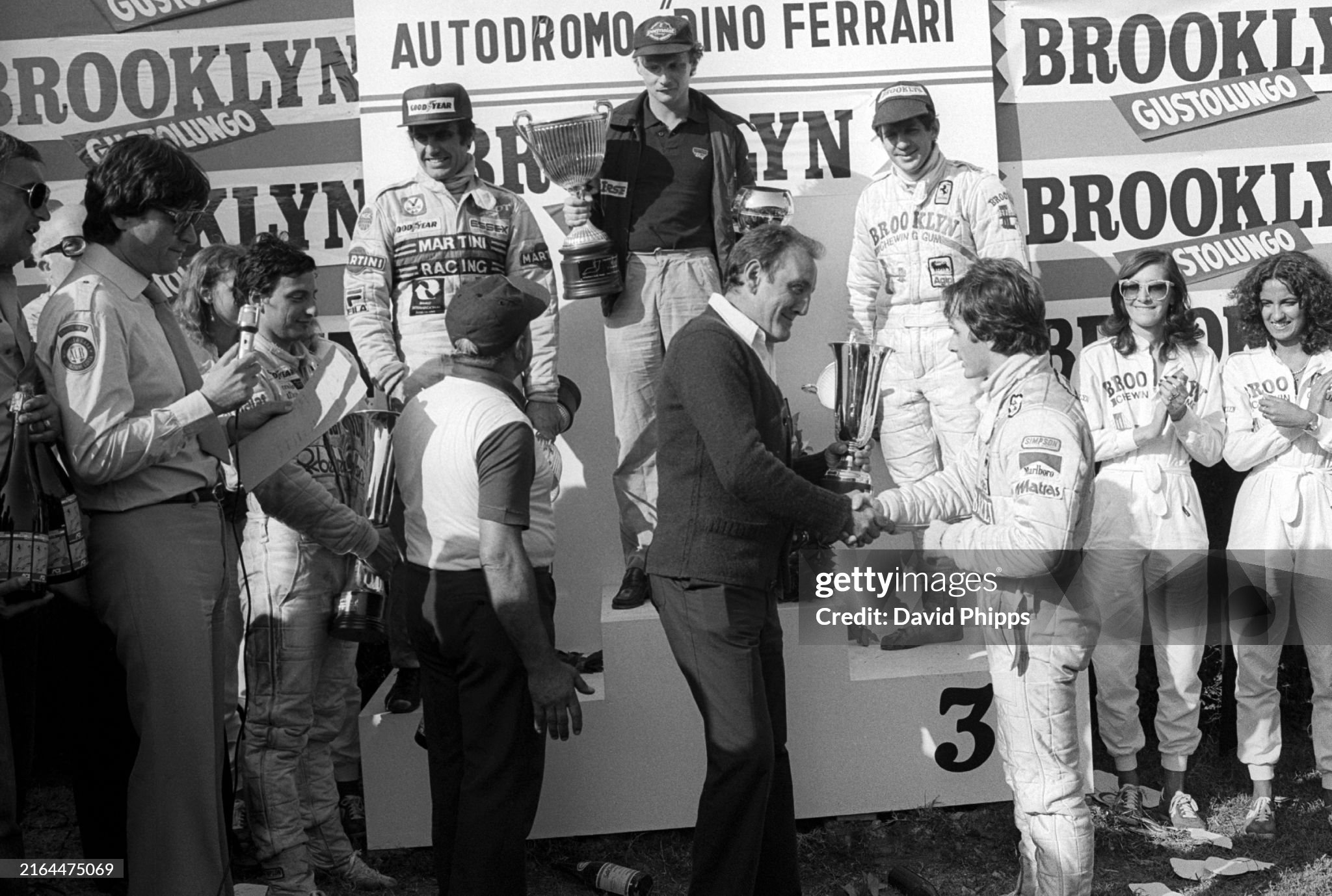 The podium (left to right): Riccardo Patrese, Arrows, fourth; Carlos Reutemann, Lotus, second; Niki Lauda, Brabham, race winner; Jody Scheckter, Ferrari, third; Gilles Villeneuve, Ferrari, seventh and fastest lap setter. Non-championship Formula One Gran Premio Dino Ferrari at Imola, Italy, on 16 September 1979. 