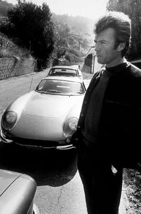Clint Eastwood in the early 1970s with his silver 1966 Ferrari 275 GTB.