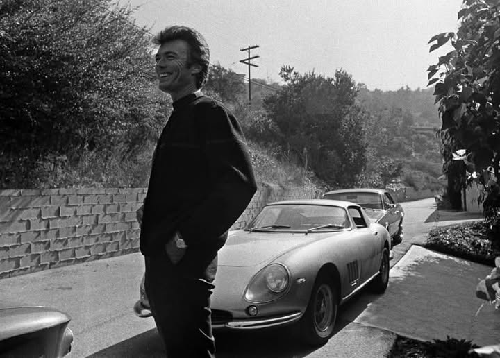 Clint Eastwood in the early 1970s with his silver 1966 Ferrari 275 GTB.