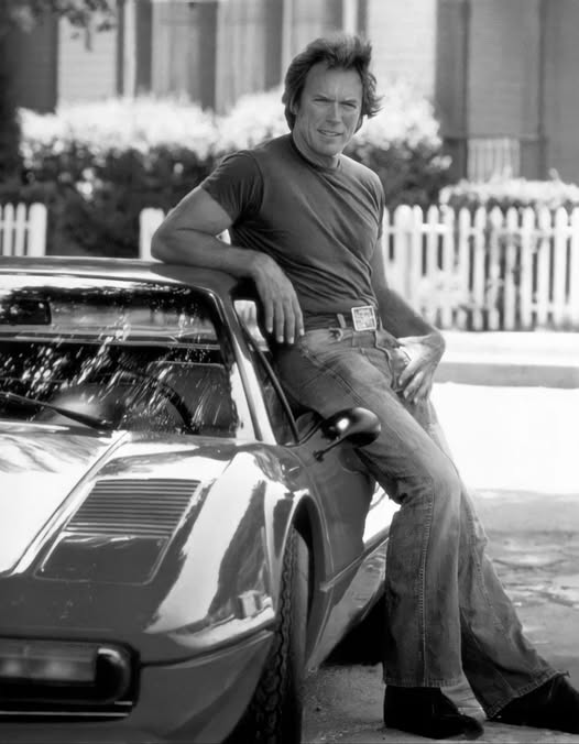 Clint Eastwood striking a pose with his Ferrari 308 GTB in 1978.