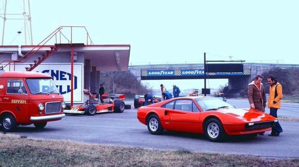 Niki Lauda and Clay Regazzoni at the Ferrari Fiorano test track in Italy, late 1975, next to a brand new Ferrari 308 GTB.